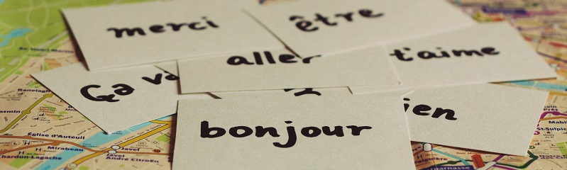 Flashcards with French words including bonjour, aller, merci, etre, je t'aime